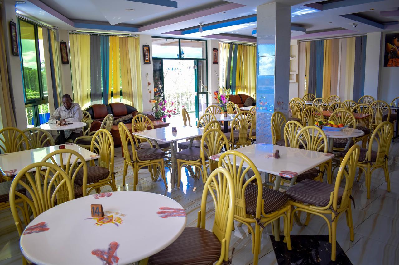 The Joy Hotel Voi Exterior photo